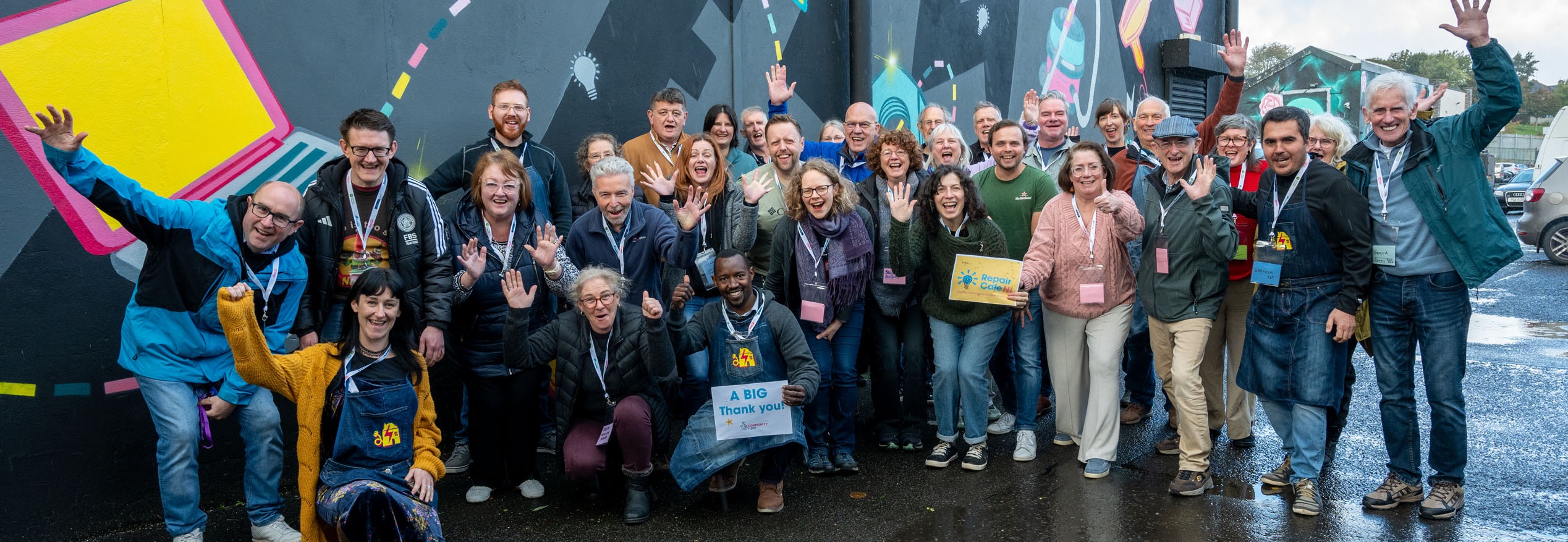 A group of volunteers cheer as they get ready for a Repair Cafe in Moira recently. 